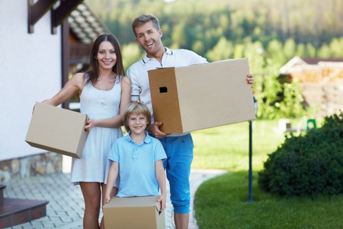 Business removals setup with office furniture and boxes ready for relocation