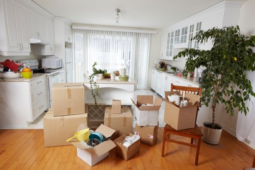 Loading furniture into a removal van near Carshalton homes