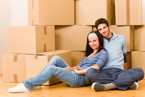 Packed moving boxes and furniture ready for transport