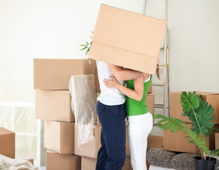 Loading furniture and boxes into a removals van for a Carshalton property