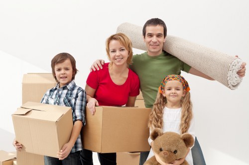 Removals van loading furniture for a local move in Carshalton