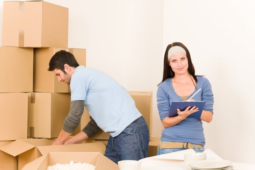 Removal team loading household items during a Carshalton relocation