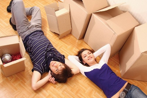 Furniture and boxes being loaded by movers in Carshalton