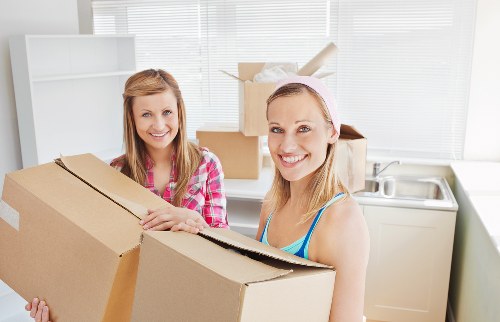 Packed boxes and furniture ready for transport during a Carshalton move