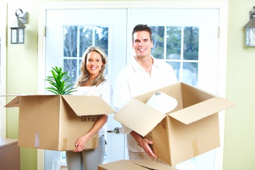 Loading furniture into a moving truck in Carshalton